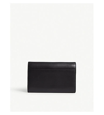Shop Michael Michael Kors Logo Leather Carryall Wallet In Black