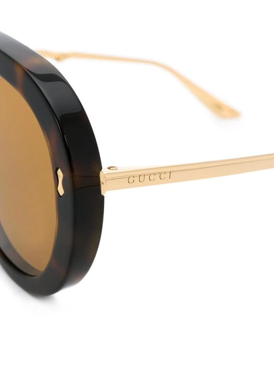 Shop Gucci Eyewear Aviator Sunglasses - Brown