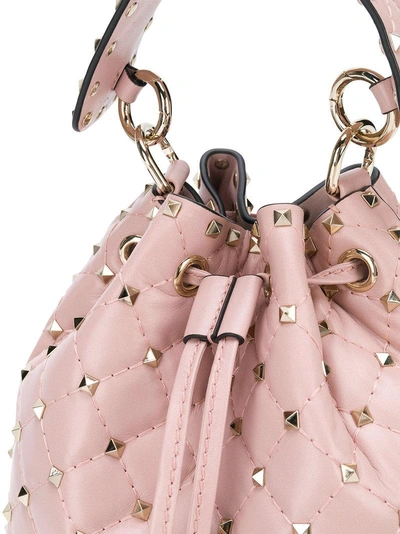 Shop Valentino Small  Garavani Rockstud Bucket Bag In Pink & Purple