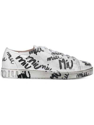 Shop Miu Miu Scribble Print Lace Up Trainers - White