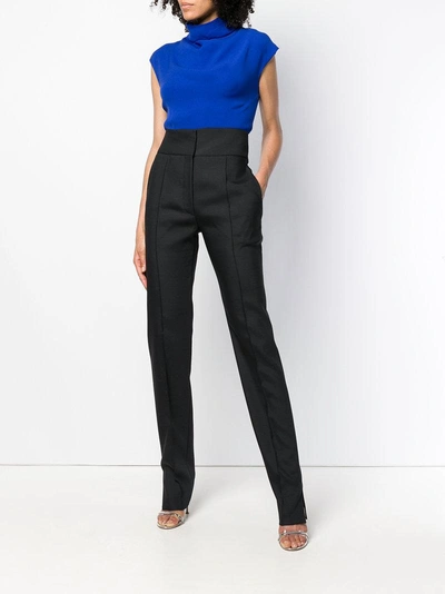 Shop Valentino High-waisted Trousers - Black