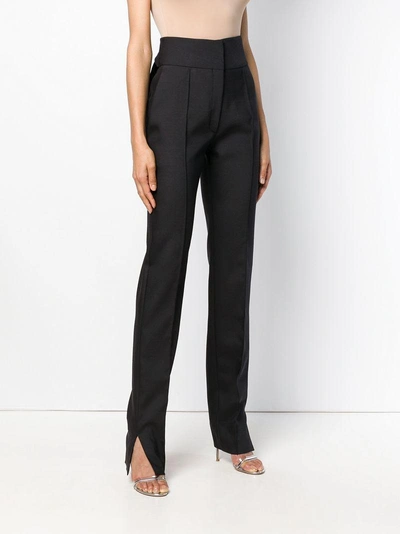 Shop Valentino High-waisted Trousers - Black