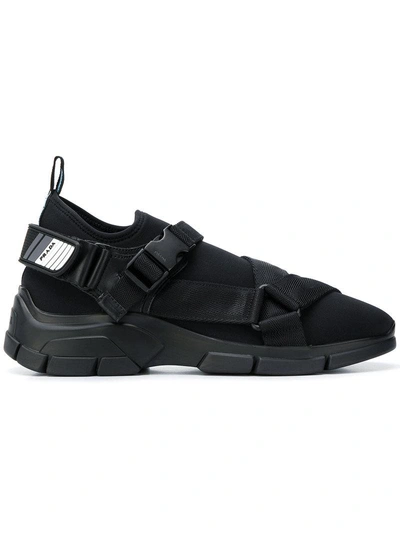 Shop Prada Buckled Sock Sneakers - Black