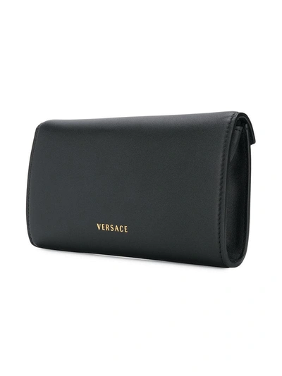 Shop Versace Icon Embellished Shoulder Bag - Black