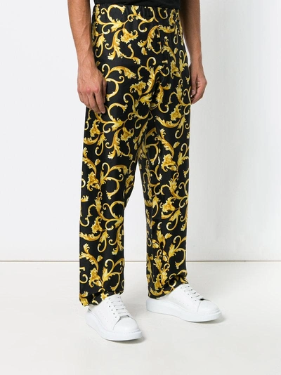 Shop Versace Print Pyjama Trousers In Black