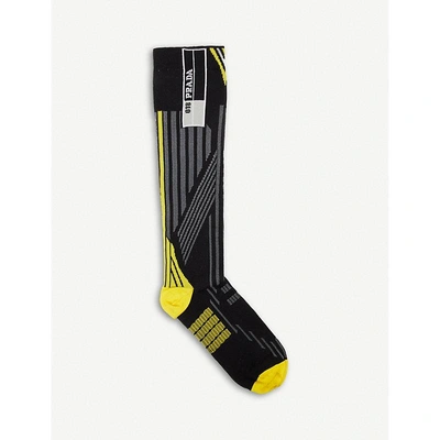 Shop Prada Striped Geometric Knitted Socks In Nero/giallo