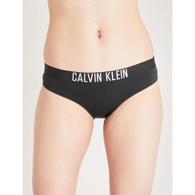 Shop Calvin Klein Logo-print Bikini Bottoms In 001 Pvh Black