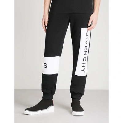 Shop Givenchy Logo-print Cotton-jersey Jogging Bottoms In Black