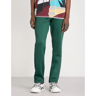 Shop Valentino Rockstud-detail Relaxed-fit Jersey Jogging Bottoms In Emerald