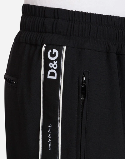 Shop Dolce & Gabbana Cady Jogging Pants With Branded Bands In Black