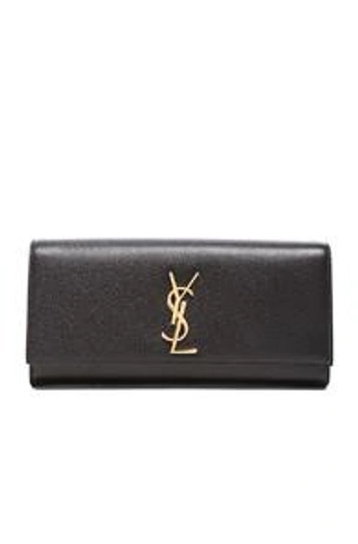 Shop Saint Laurent Monogram Clutch In Black