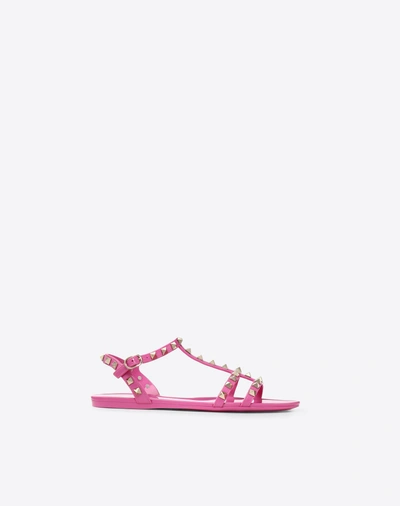 Shop Valentino Rockstud Flat Rubber Sandals In Poudre