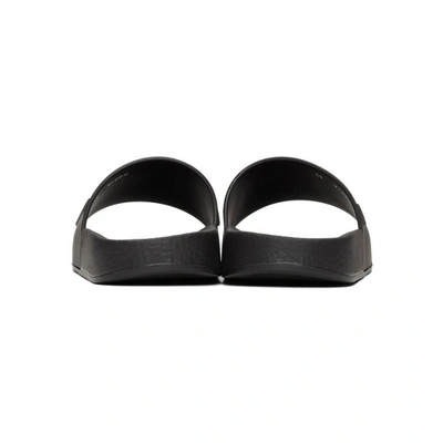 Shop Valentino Black  Garavani 'vltn' Slides