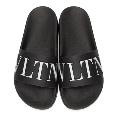 Shop Valentino Black  Garavani 'vltn' Slides