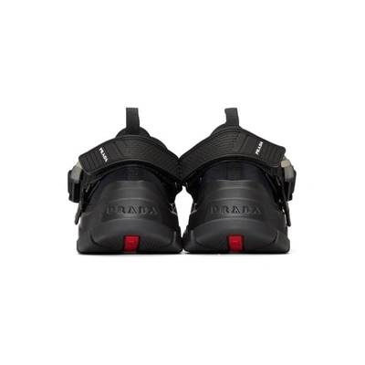 Shop Prada Black Buckled Neoprene Sneakers In F0002 Black