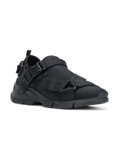 Shop Prada Neoprene Buckle Sneakers - Black