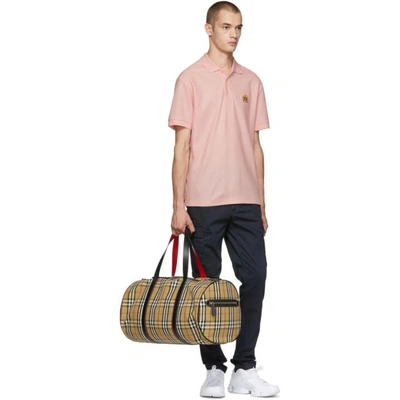 Shop Burberry Pink Densford Polo In Palepink
