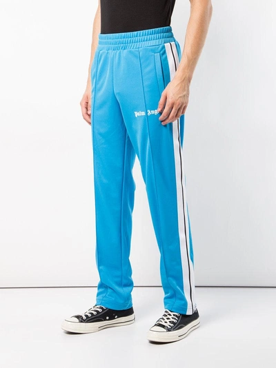 Shop Palm Angels Logo Track Pants In Blue