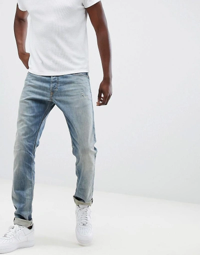 Diesel Tepphar Slim Carrot Fit Distressed Jeans In 084uk - Blue | ModeSens