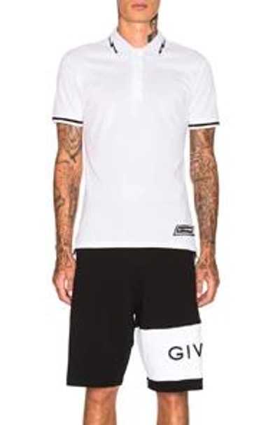 Shop Givenchy Lightning Bolt Polo In White & Black