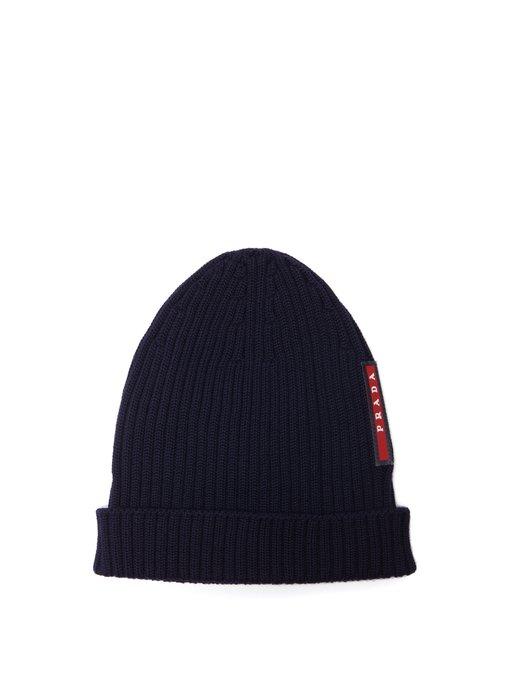 Prada Logo-embellished Ribbed-knit Beanie Hat In Navy | ModeSens