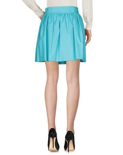Shop Moschino Knee Length Skirts In Azure