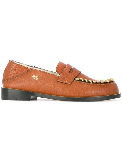 Shop Le Mocassin Zippe Textured Leather Loafers - Brown
