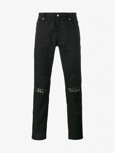 Shop Saint Laurent Ripped Stud Slim Fit Jeans In Black