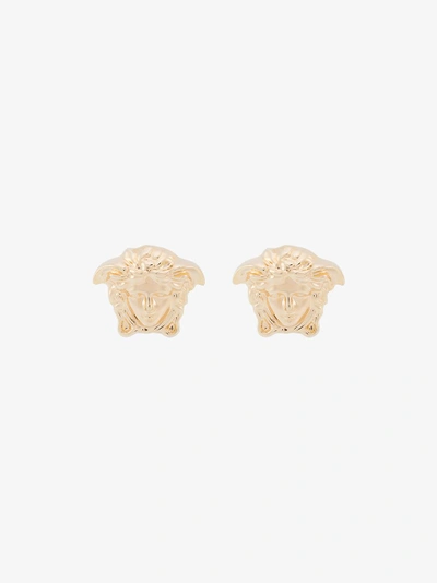 Shop Versace Gold Medusa Head Stud Earrings In Metallic