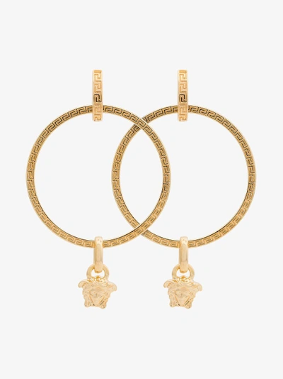 Shop Versace Gold Metallic Medusa Hoop Earrings