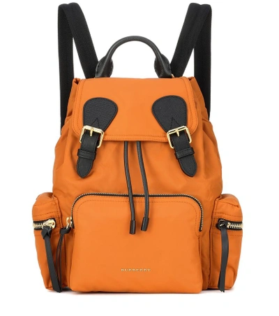 Shop Burberry The Medium Leather-trimmed Backpack In Orange