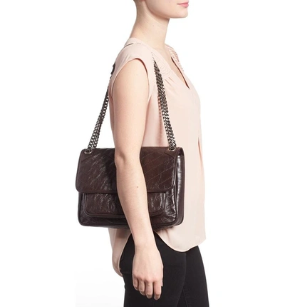 Shop Saint Laurent Medium Niki Leather Shoulder Bag In Tulip
