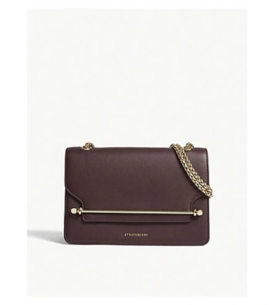 Shop Strathberry East/west Leather Cross-body Bag In Burgundy