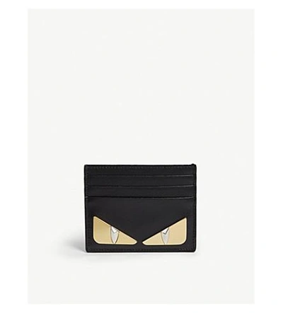 Shop Fendi Monster Metal Eyes Leather Card Holder In Black/gold