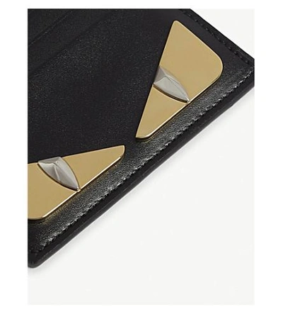 Shop Fendi Monster Metal Eyes Leather Card Holder In Black/gold
