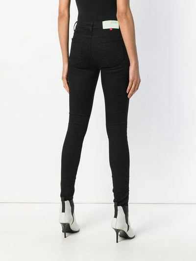 Shop Off-white Floral Embroidered Skinny Jeans In Black