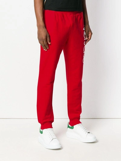 Shop Versace Logo Print Track Pants - Red