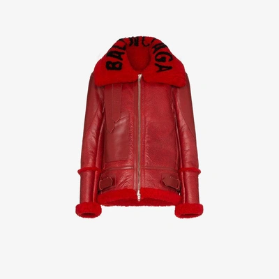 Shop Balenciaga Bombardier Oversized Leather And Shearling Coat In Red