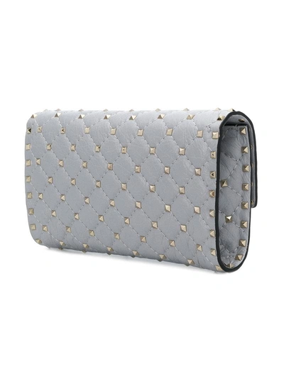 Shop Valentino Garavani Rockstud Spike Clutch - Blue