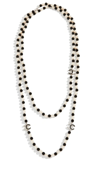 Shop Chanel Crystal Cc Necklace In Cream/black