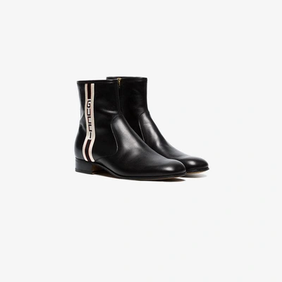 Shop Gucci Stripe Leather Boots In Black