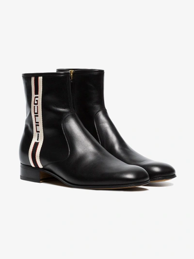 Shop Gucci Stripe Leather Boots In Black