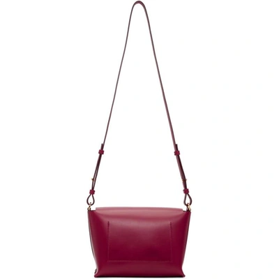 Shop Sophie Hulme Red The Pinch Crossbody Bag In Raspberry
