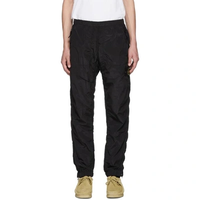 Shop Stone Island Black Logo Badge Track Pants In V0029 Black