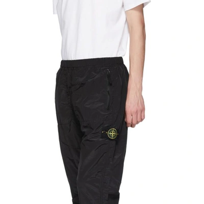 Shop Stone Island Black Logo Badge Track Pants In V0029 Black