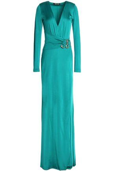 Shop Roberto Cavalli Wrap-effect Embellished Satin Gown In Teal