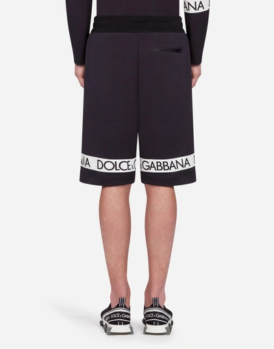 Shop Dolce & Gabbana Cotton Bermuda Jogging Shorts With Print In Black