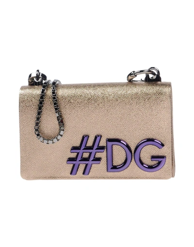 Shop Dolce & Gabbana Cross-body Bags In Gold