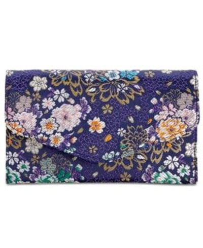 Shop Steve Madden Global Clutch In Blue Floral/gold