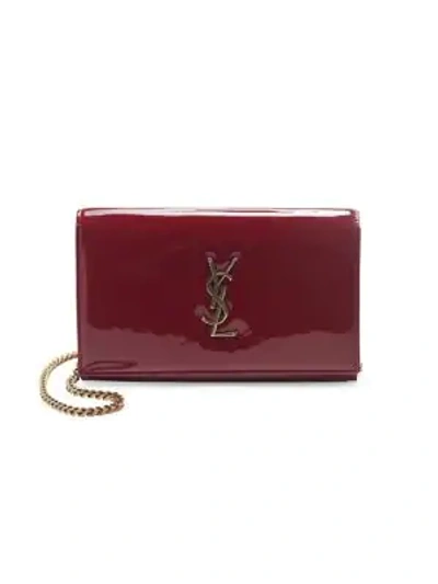 Shop Saint Laurent Patent Leather Chain Wallet In Rouge